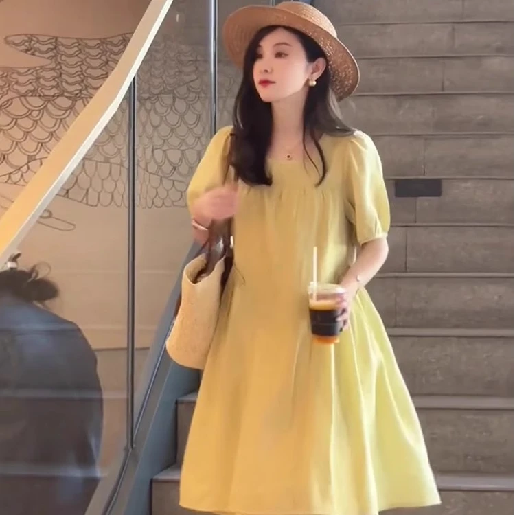 泡泡袖黄色连衣裙2025新款女夏高级感穿搭小个子网红爆款绝美裙子