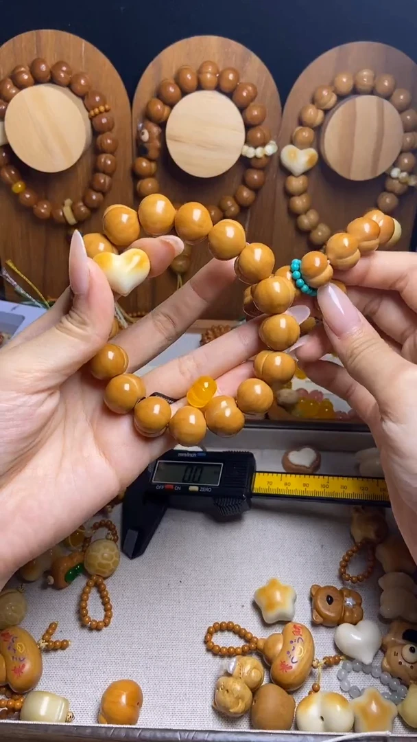 手串猴头核桃A****.全品猴头屁桃17爱心黄晶隔片绿跑环新绿流苏