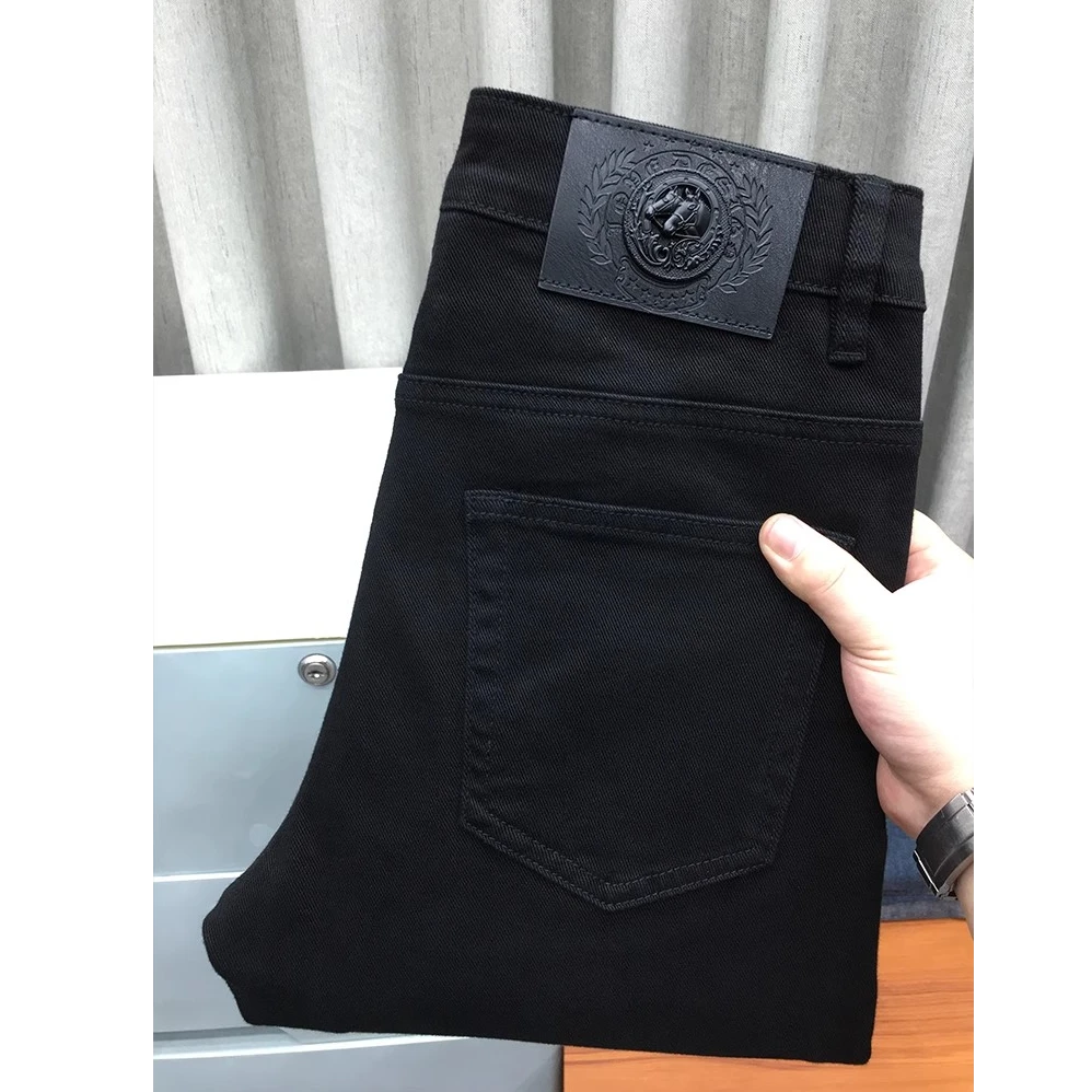 高端秋季黑色牛仔长裤男士欧美潮牌弹力修身小脚休闲时尚宽松直筒