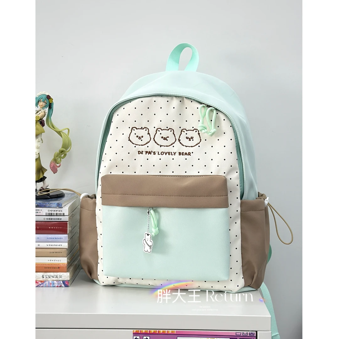 日系ins百搭轻便复古风撞色波点双肩包女初高中生高颜值书包