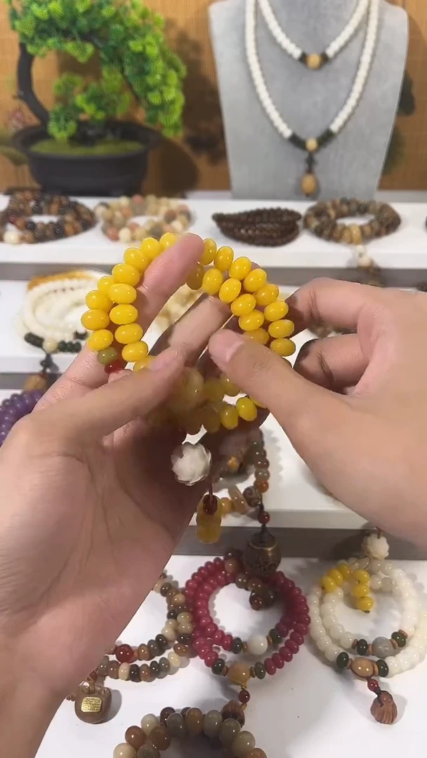 手串菩提根/象牙果卡8*11帝黄菩提双圈