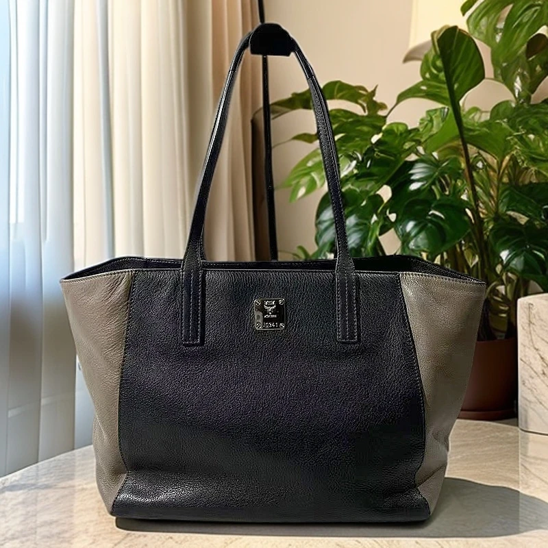 95新 MCM 黑色拼卡其色托特包G24019915底长:34*30