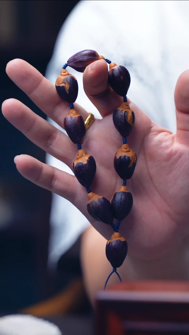 橄榄核手串/手链紫皮【包衣弥勒】