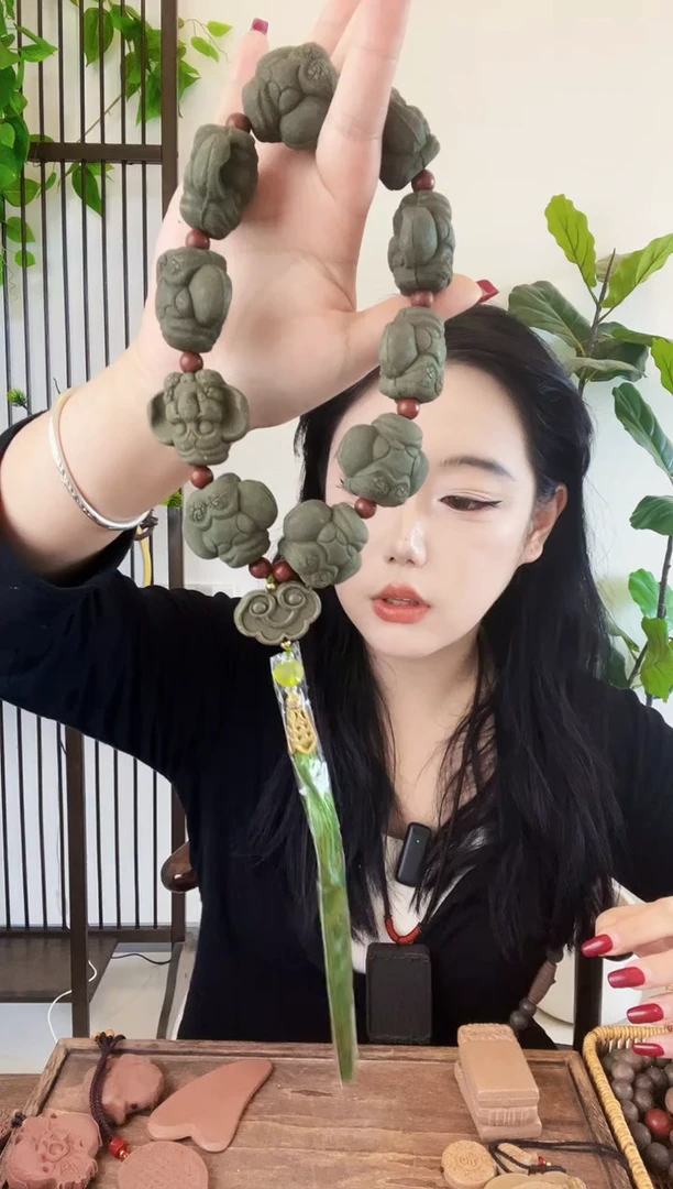 泥塑青瑶露小象手持