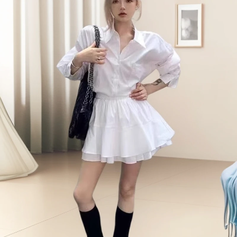 2025秋季新款休闲时尚简约设计感长袖衬衫女收腰显瘦A字短裙套装