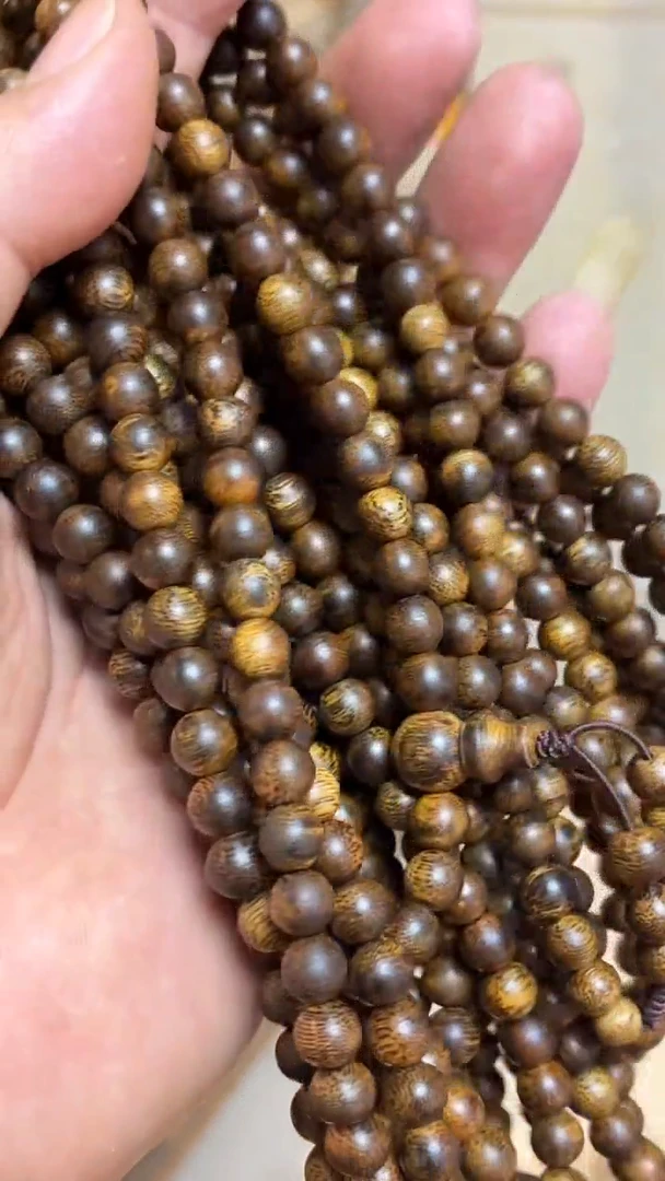 沉香手串 海南红金猊圆珠长串0.7多样性发其一