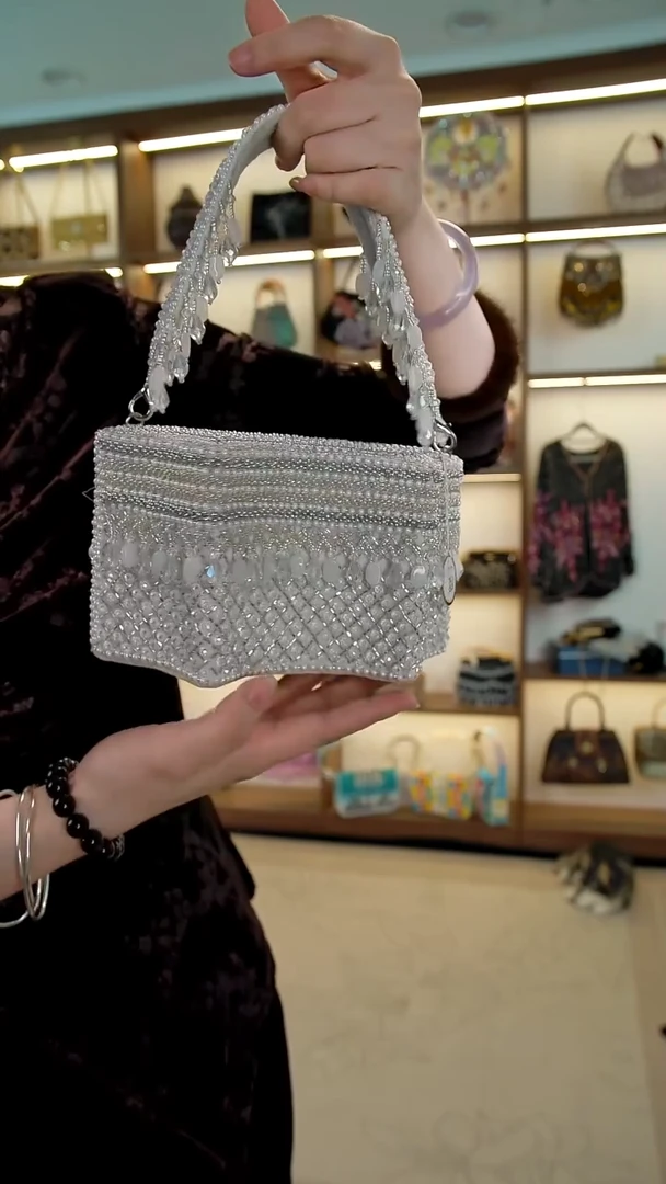 织物9百格汇手工串珠包