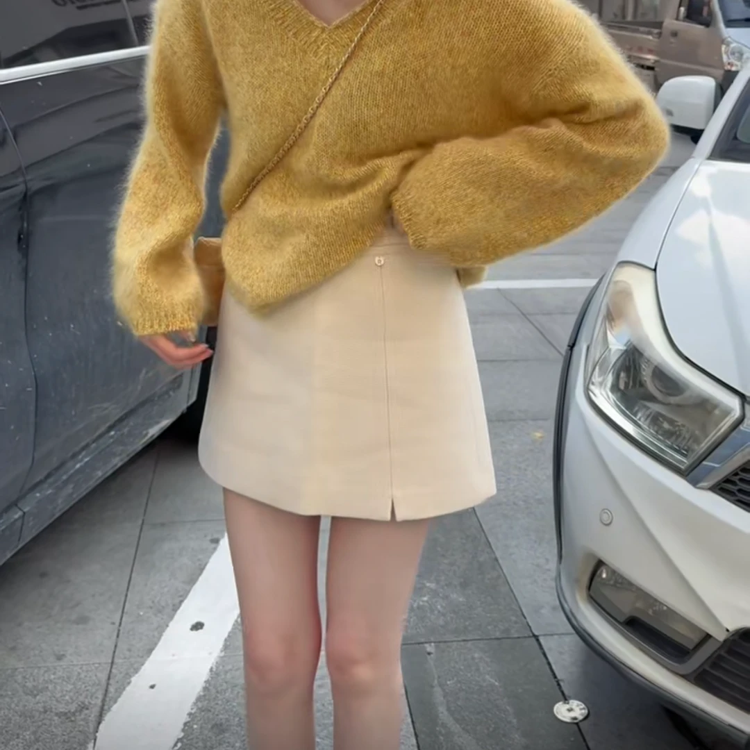 WML/2025秋冬新款上新 275705设计感小开叉百搭短裙