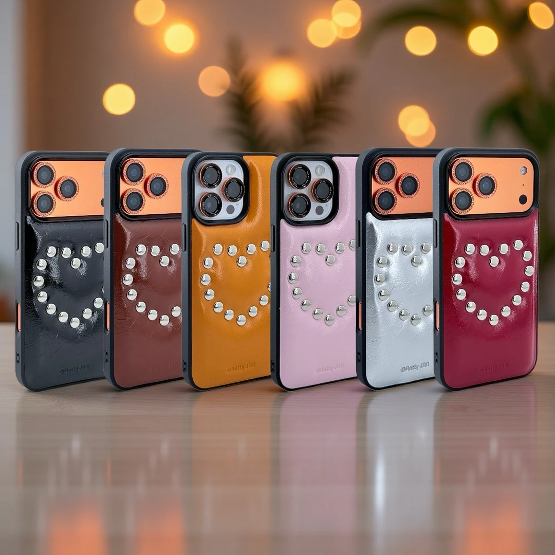 创意小众油蜡皮爱心铆钉挂绳适用苹果13-17ProMax多款型号手机壳