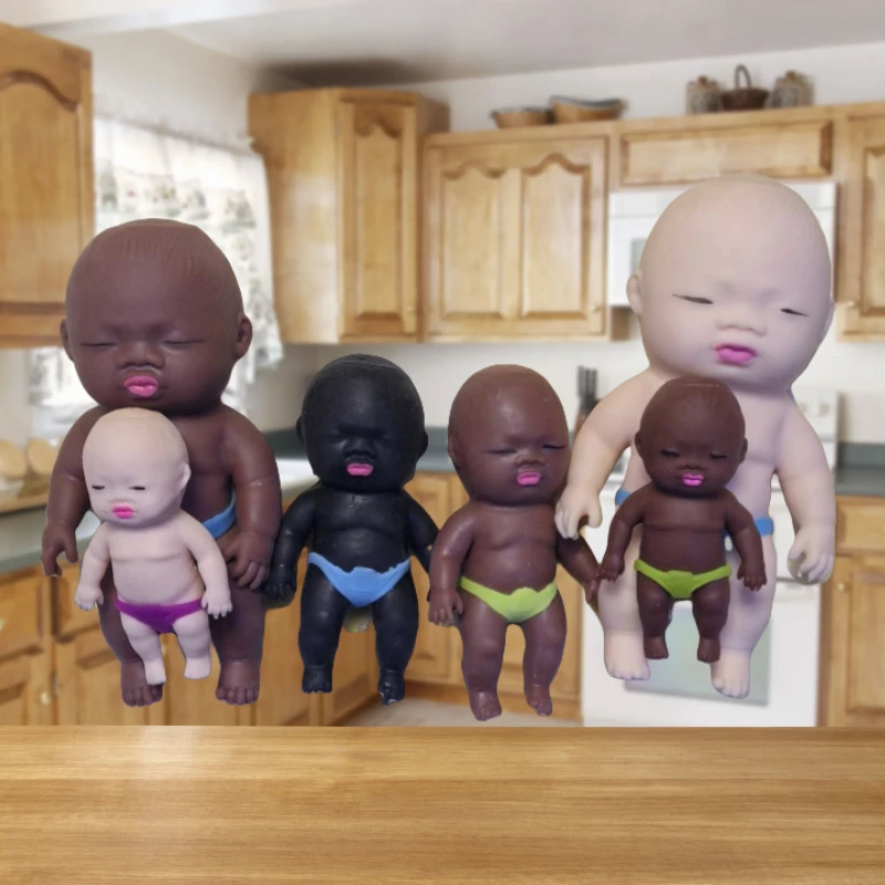 可爱黑娃娃捏捏乐慢回弹掌心橡胶玩偶丑萌搞怪玩具拉拉乐网红玩具