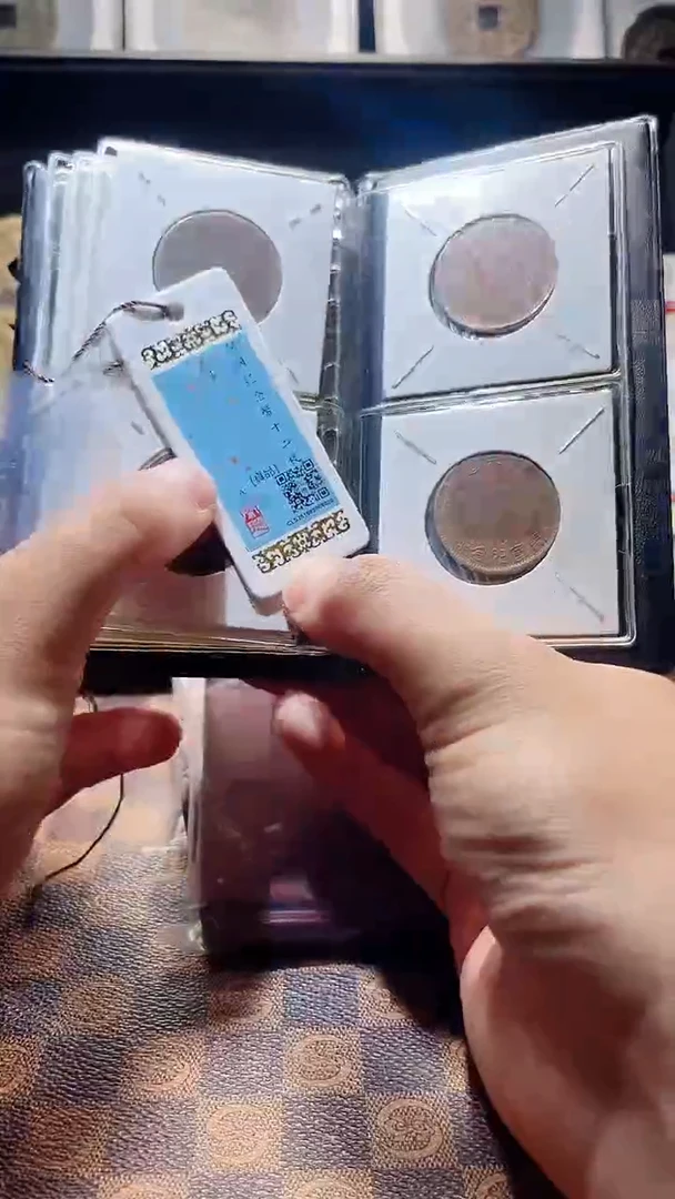 铜A674闻德民国开国纪念币十二枚册(斐鹏)