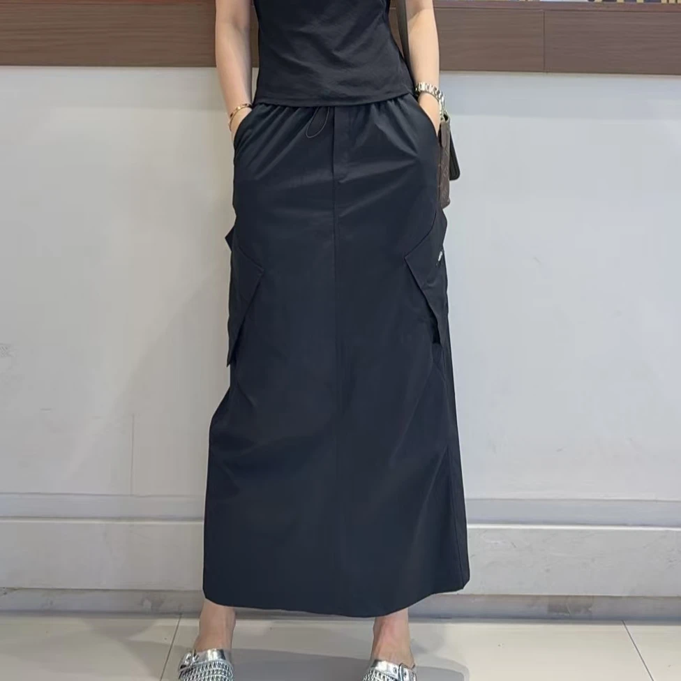 迷巧时尚2025夏季新品设计款简约百搭松紧腰开叉工装半身长裙