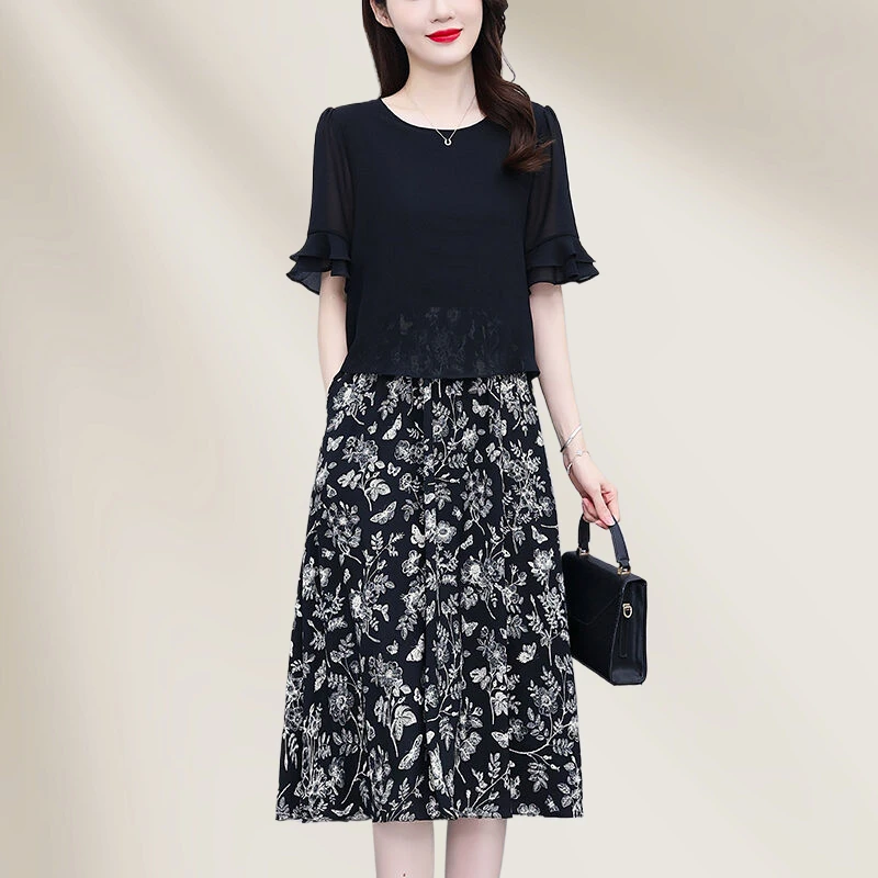 有口袋黑色连衣裙女爆款夏季新款时尚气质显瘦假两件拼接碎花裙子