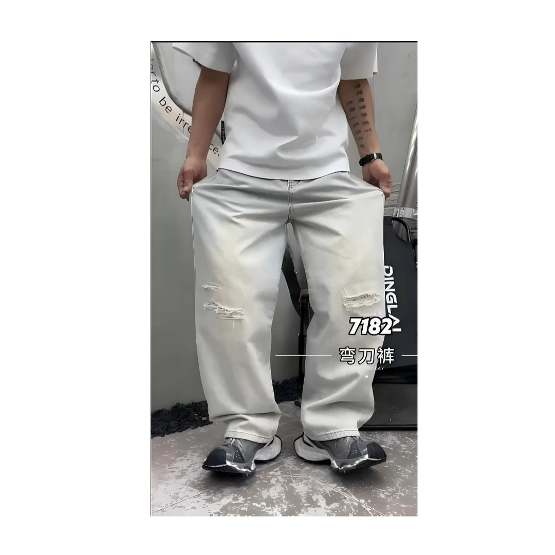 夏季美式牛仔裤潮流行高街白色抹脏设计感破洞弯刀牛仔裤高级感