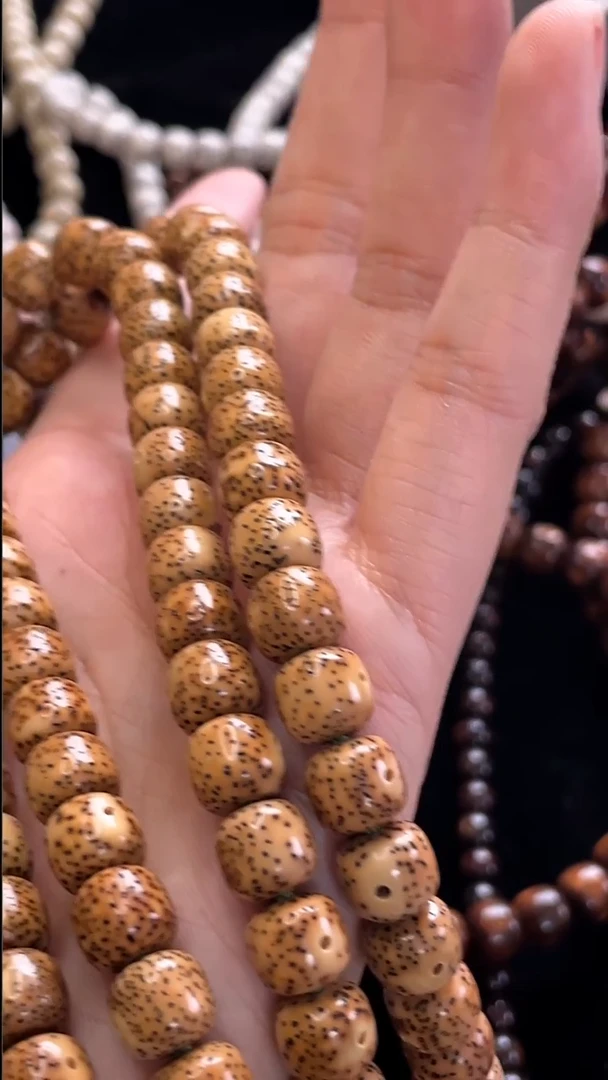 吊坠星月菩提精工级粉皮陈籽桶珠9*8长串（B）