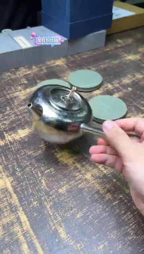 此**处博友制钛听泉侧把煮水壶