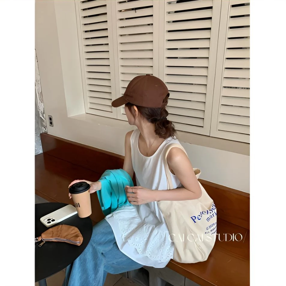 【福利】拼接蕾丝边下摆叠穿圆领宽松休闲无袖背心上衣小众气质白色