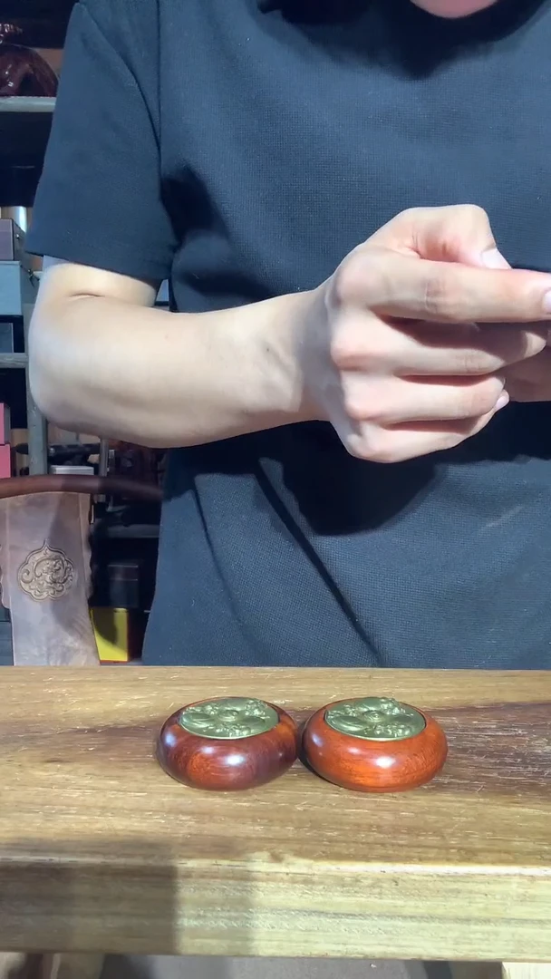 木紫檀牛转乾坤手把件一对