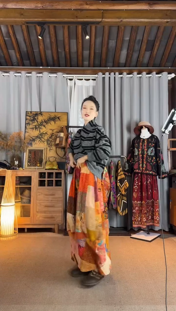 设计师款橘色丝织拼接花苞裙