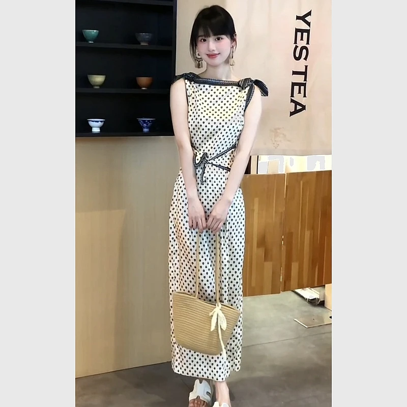 白色波点连衣裙2025夏季气质高级感超好看独特漂亮法式掐腰长裙子
