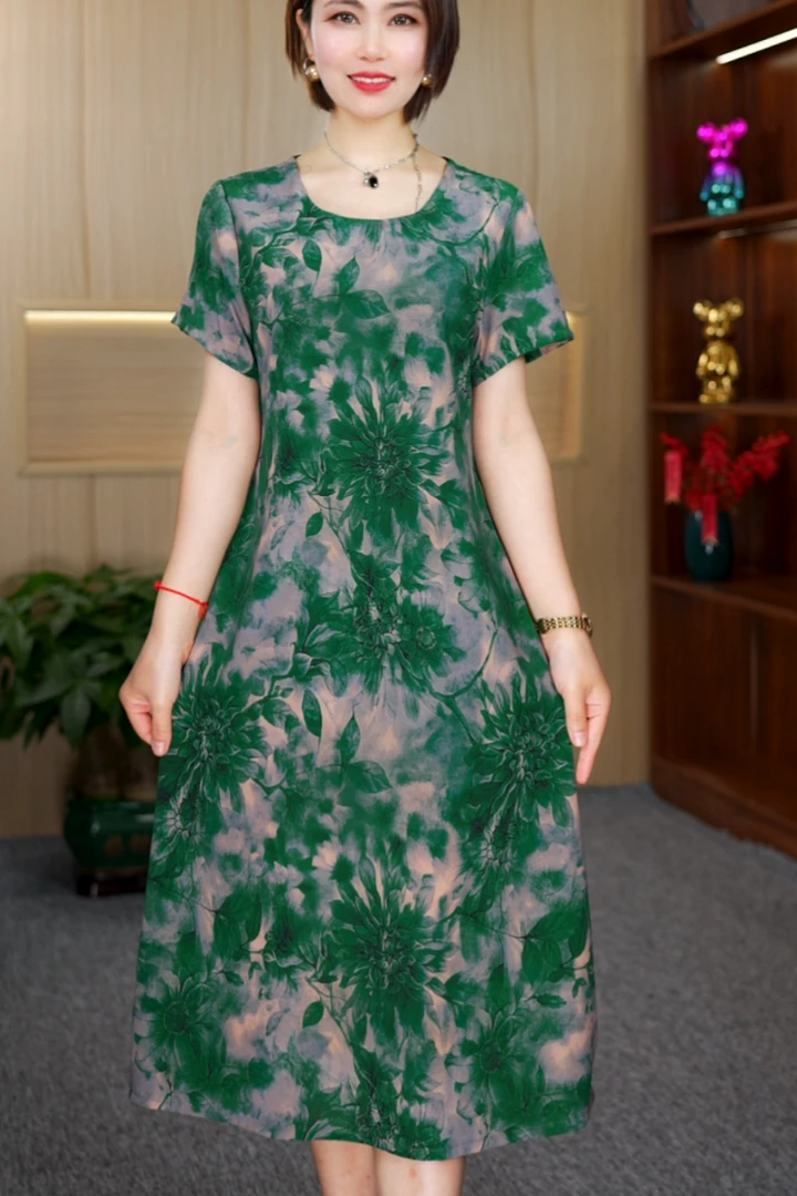 A-25248时尚遮肉显瘦连衣裙圆领绿色向阳花