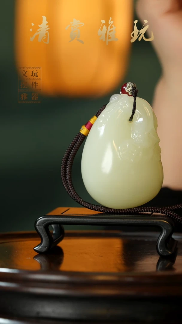 玉《钱袋子富得流油》手把件摆件