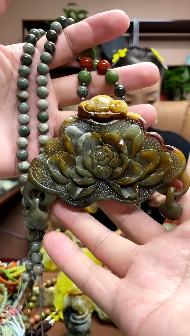 未镶嵌岫玉颈饰唐**。·