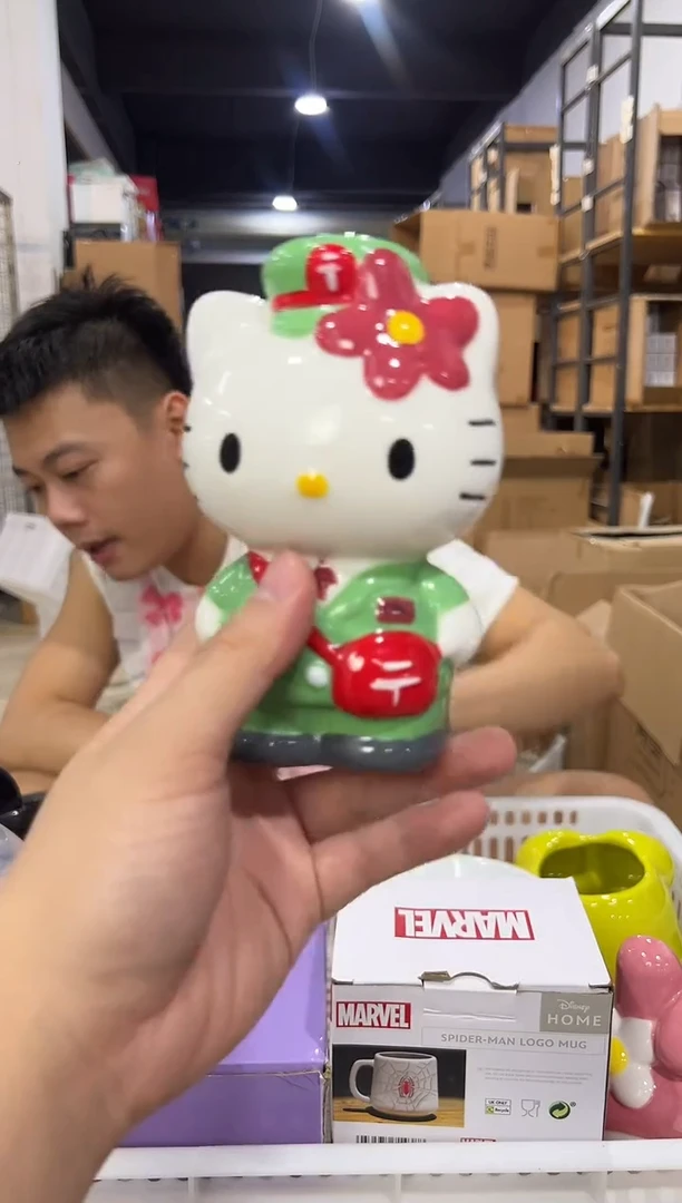 瓷片绿色kt猫邮递员存钱罐