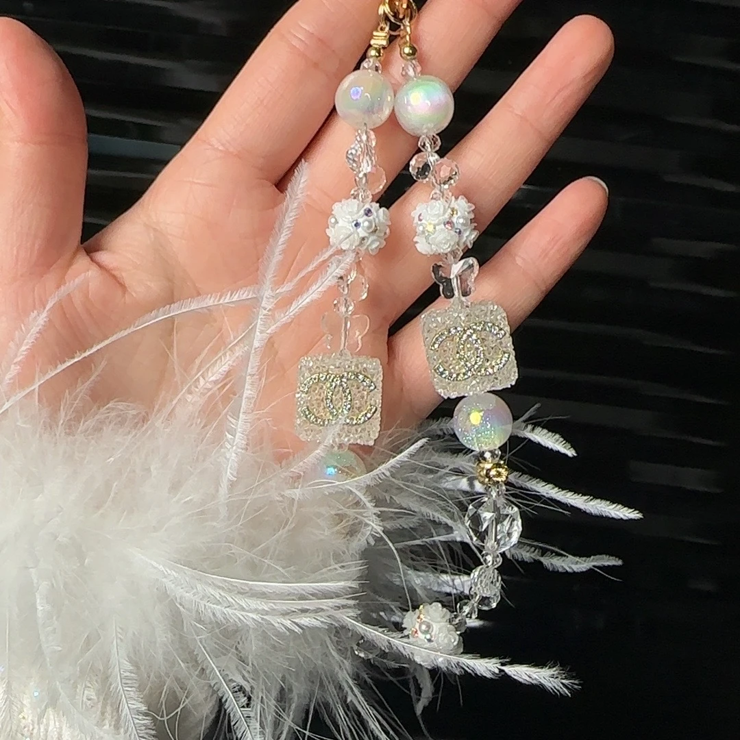 手链时尚经典山茶花可爱手机链高级感挂件短款手机壳防丢挂坠女