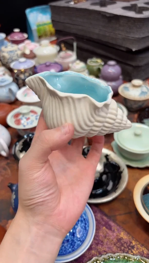摩吉陶陶闪拍链接 海螺公道杯