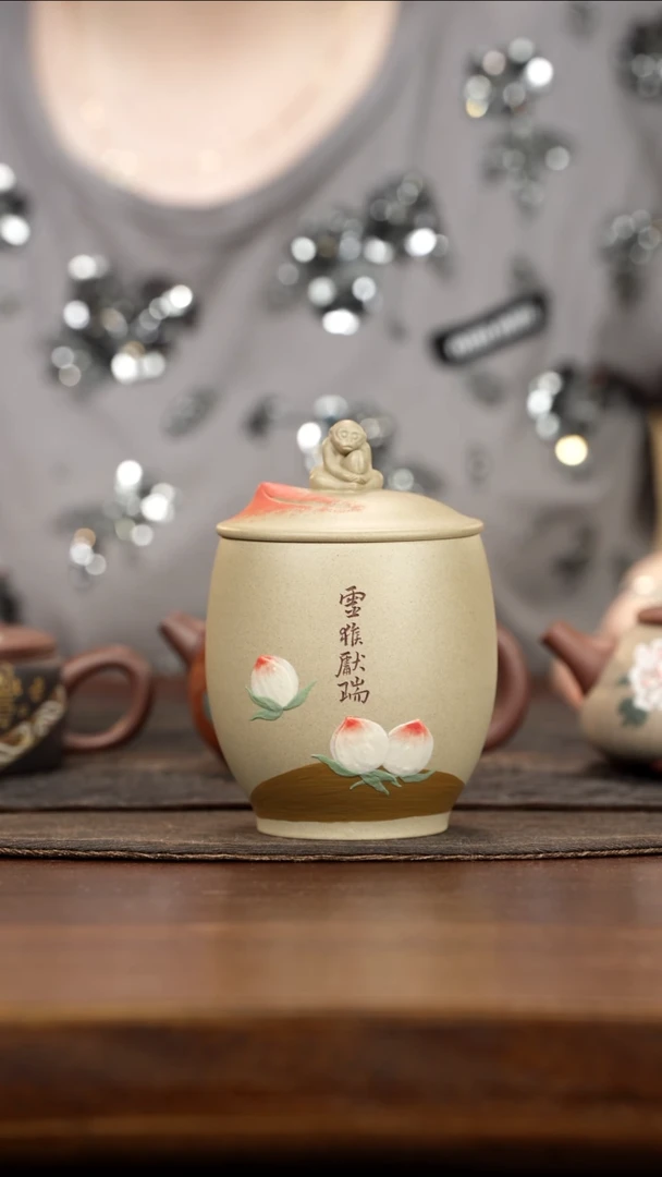 紫砂茶叶罐征**我羊脂白玉段泥绘寿桃茶叶罐