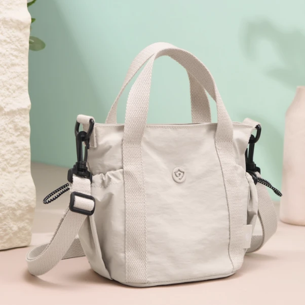 时尚小菜篮包女士手提单肩包轻便尼龙帆布小挎包多层大容量水桶包