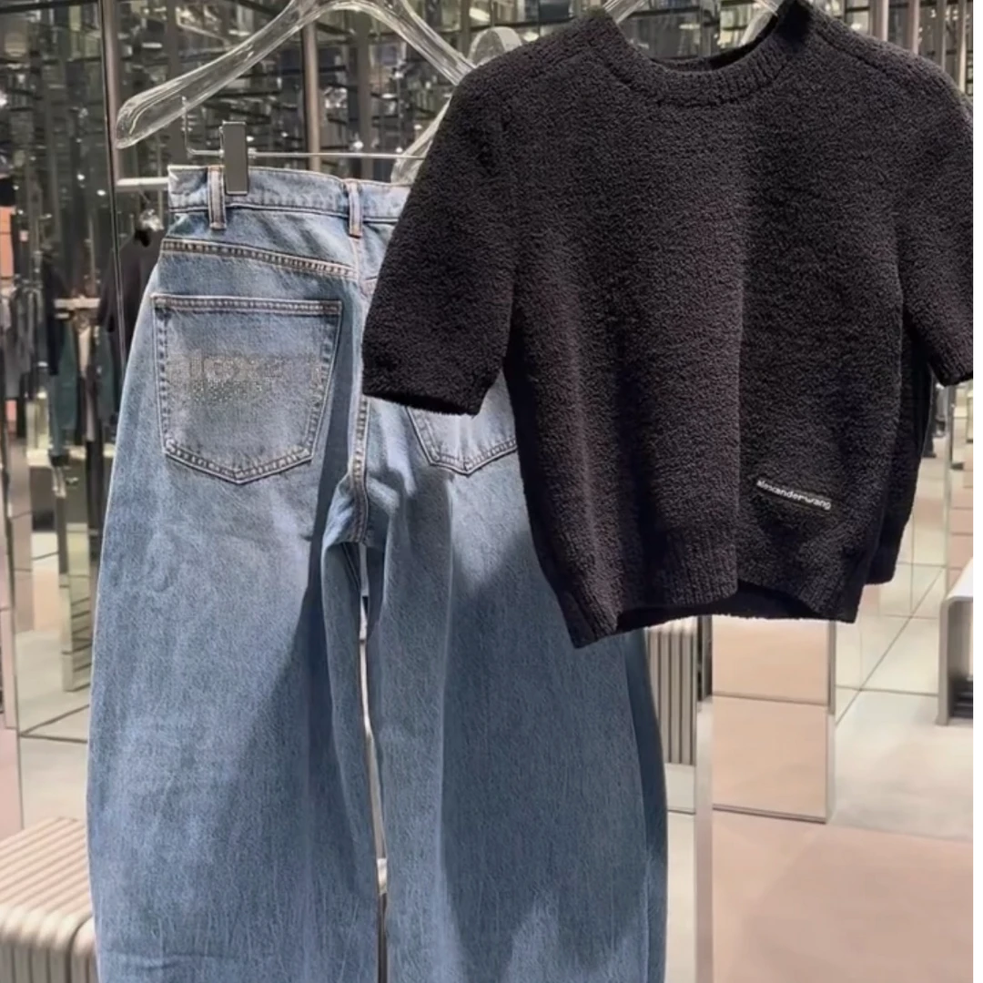 2026秋冬新款高级感别致独特小众设计针织上衣烫钻牛仔裤两件套
