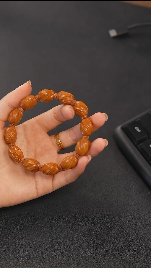 吊坠橄榄核扭转乾坤