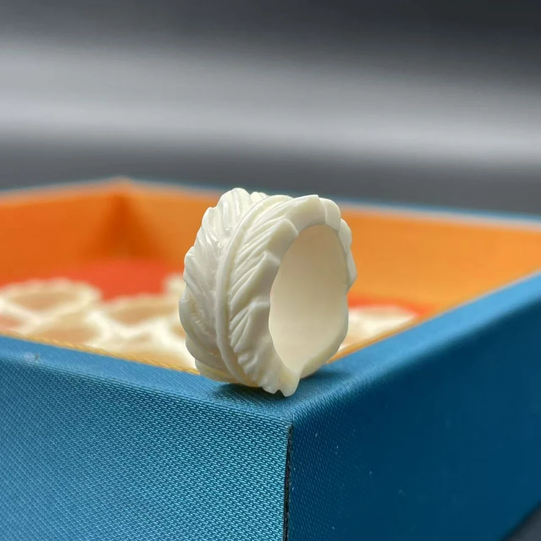 80015精品猛犸象牙内12MM左右羽毛跑环配饰