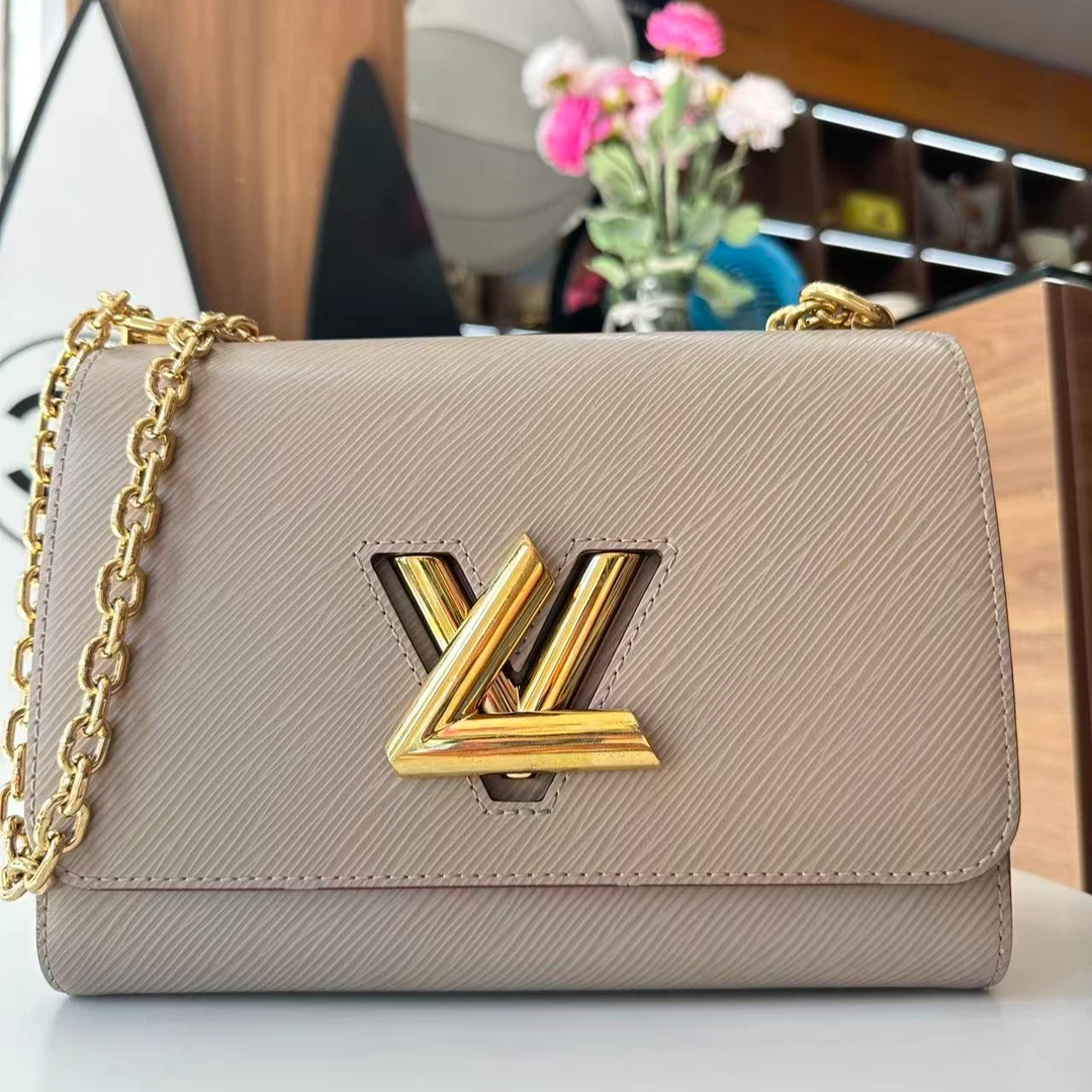 95新 LouisVuitton/路易威登 奶茶色水波纹twist/单肩时尚女士包
