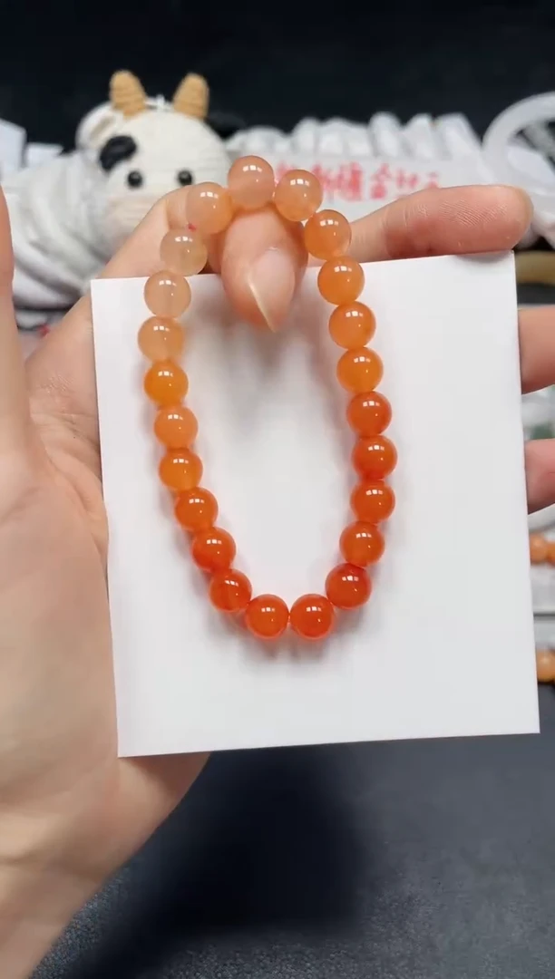 【闪购商品】石英质玉手链未镶嵌柿子红卡8