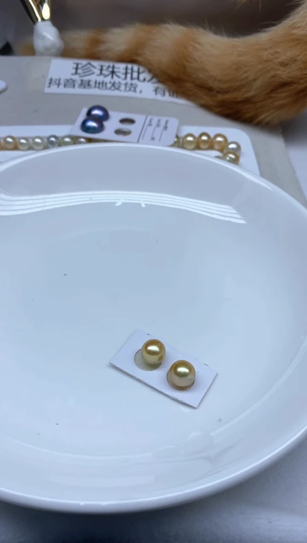 裸珠海水珍珠落***辰半孔2颗