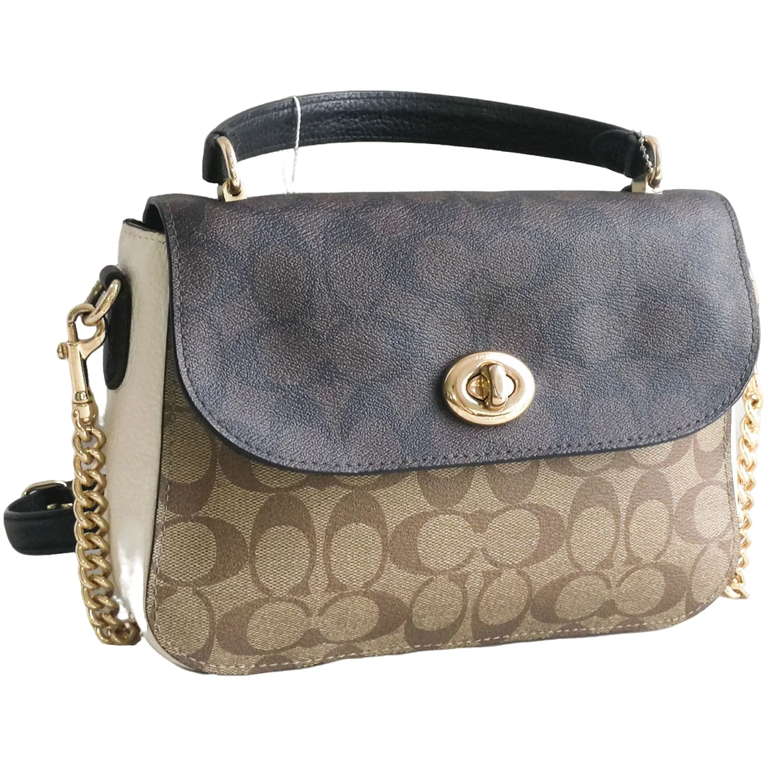 95新  Coach 棕老花单肩包 070802