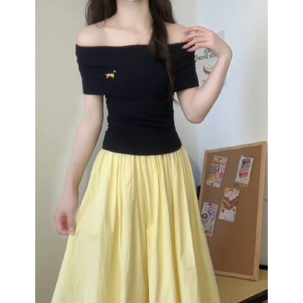 2025夏日甜美时尚套装女黑色一字肩上衣高腰显瘦褶皱半身裙两件套