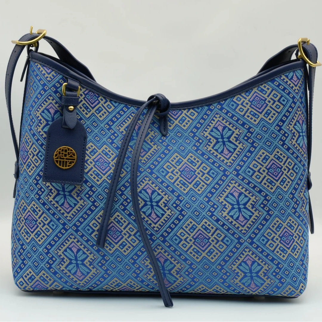 谭湘光 | 广西非遗几何壮锦磁扣国际风单肩包蝴蝶花斜跨大托特