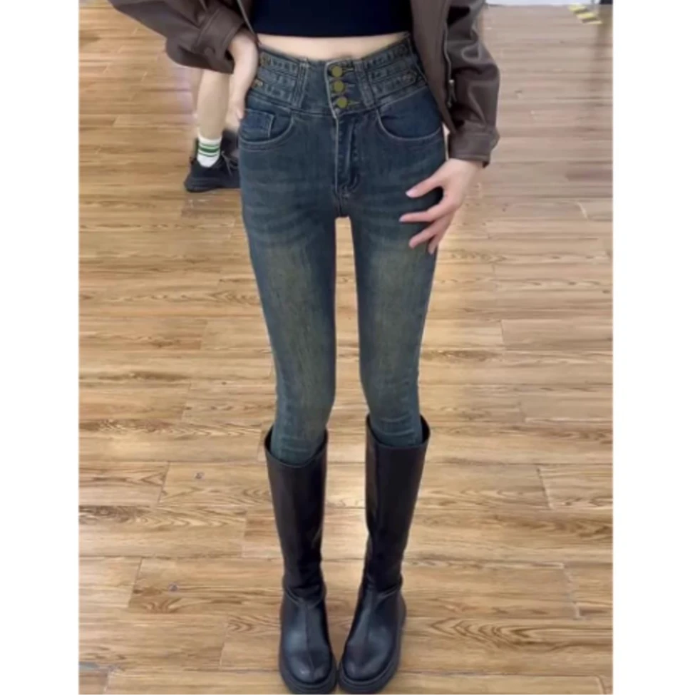 冬季新款韩系百搭设计感加绒三粒扣牛仔弹力小脚裤9675