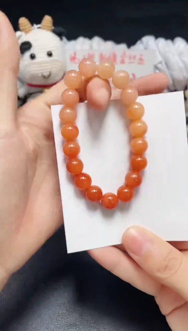 【闪购商品】石英质玉手链未镶嵌柿子红卡10