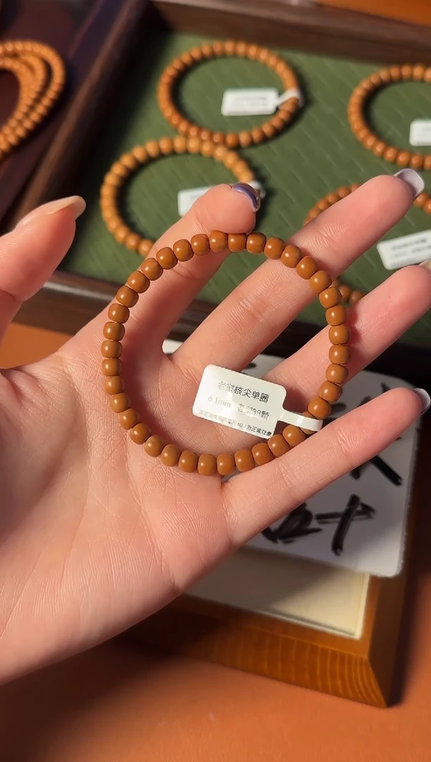 手串橄榄核【168核尖】6.1mm老挝核尖老型单圈三花面无白 树王老料