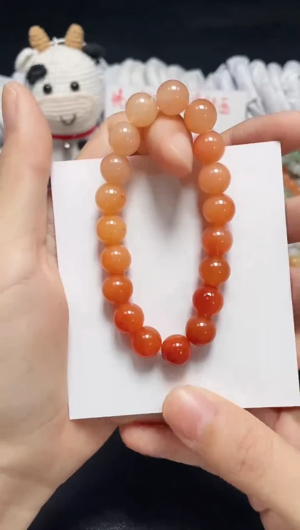 【闪购商品】石英质玉手链未镶嵌柿子红卡10