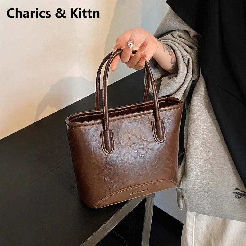 Charics&Kittn包包女2025新款高级感真皮百搭斜挎包手提包水桶包