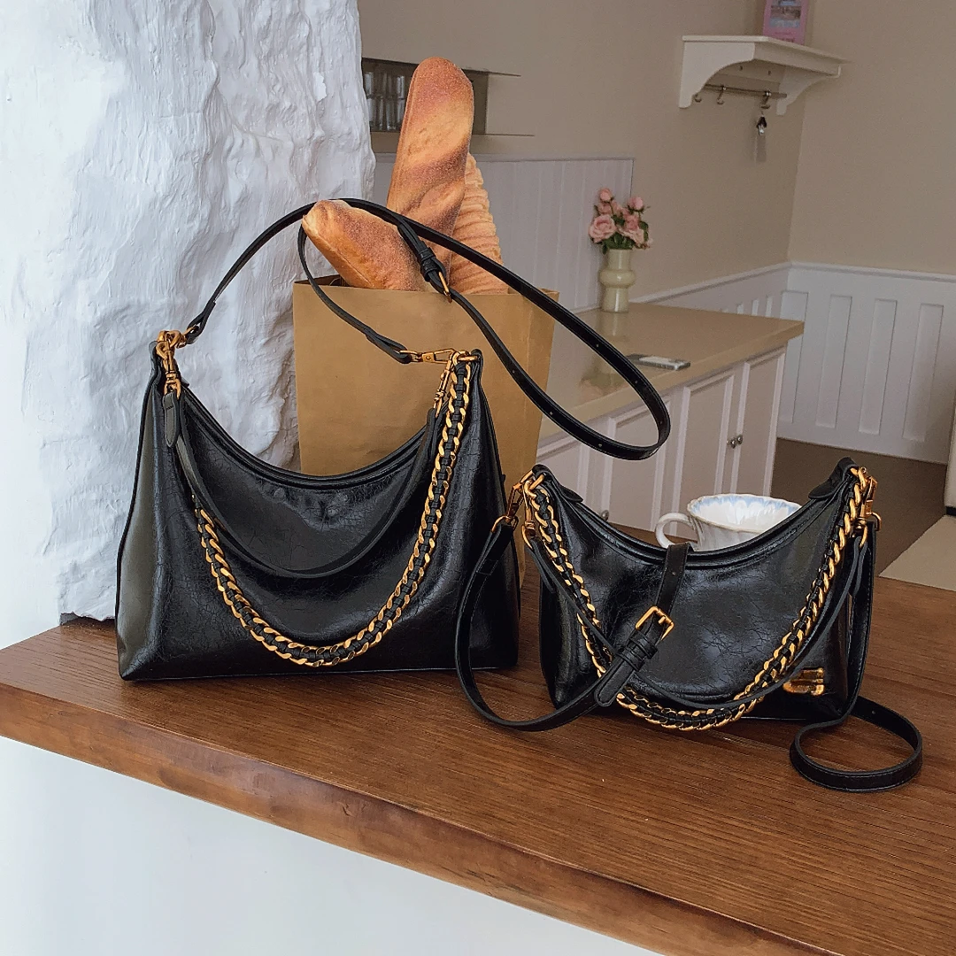 【朱丽叶】2025博主同款高品质油蜡皮轻奢饺子包复古休闲单肩斜跨包