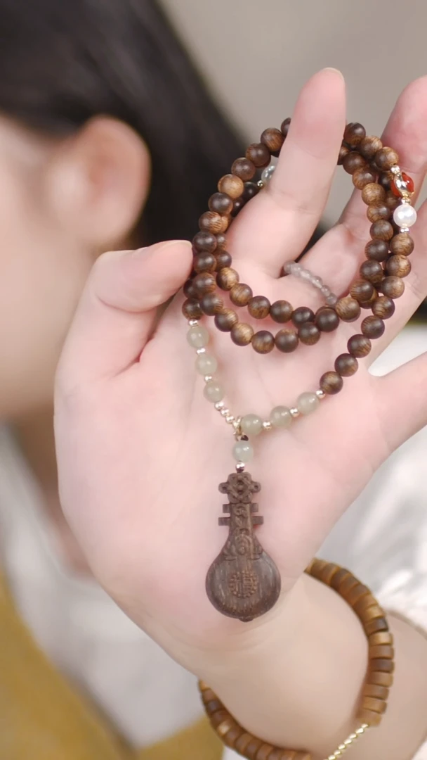 （三圈白奇楠全沉0.6项链+琵琶）