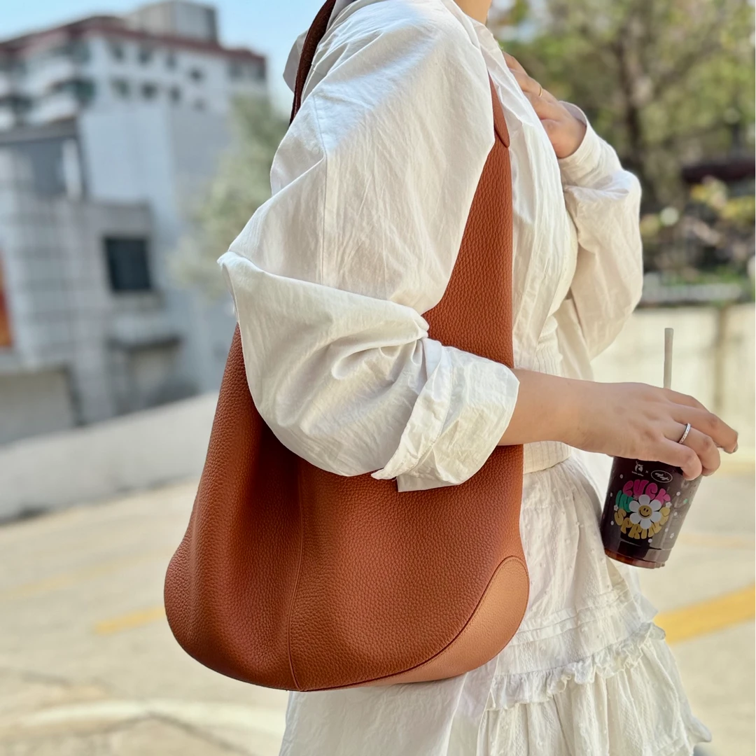 单肩腋下大容量蓝色托特包包女式2025新款高级感通勤慵懒风水桶包