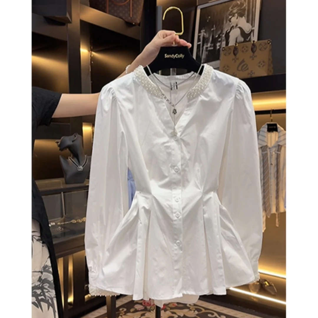今年流行爆款气质钉珠衬衫女装春季新款时髦小众纯色收腰短款上衣